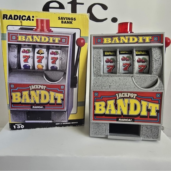 Vintage Radica Model 130 Bandit Savings coin Machine Bank Works - Picture 1 of 3